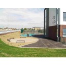 Cycle stands, litter bins, tree grilles, benches, shelters, and bollards supplied and installed by Larkin Engineering at Educate Together Primary School Hansfield Dublin